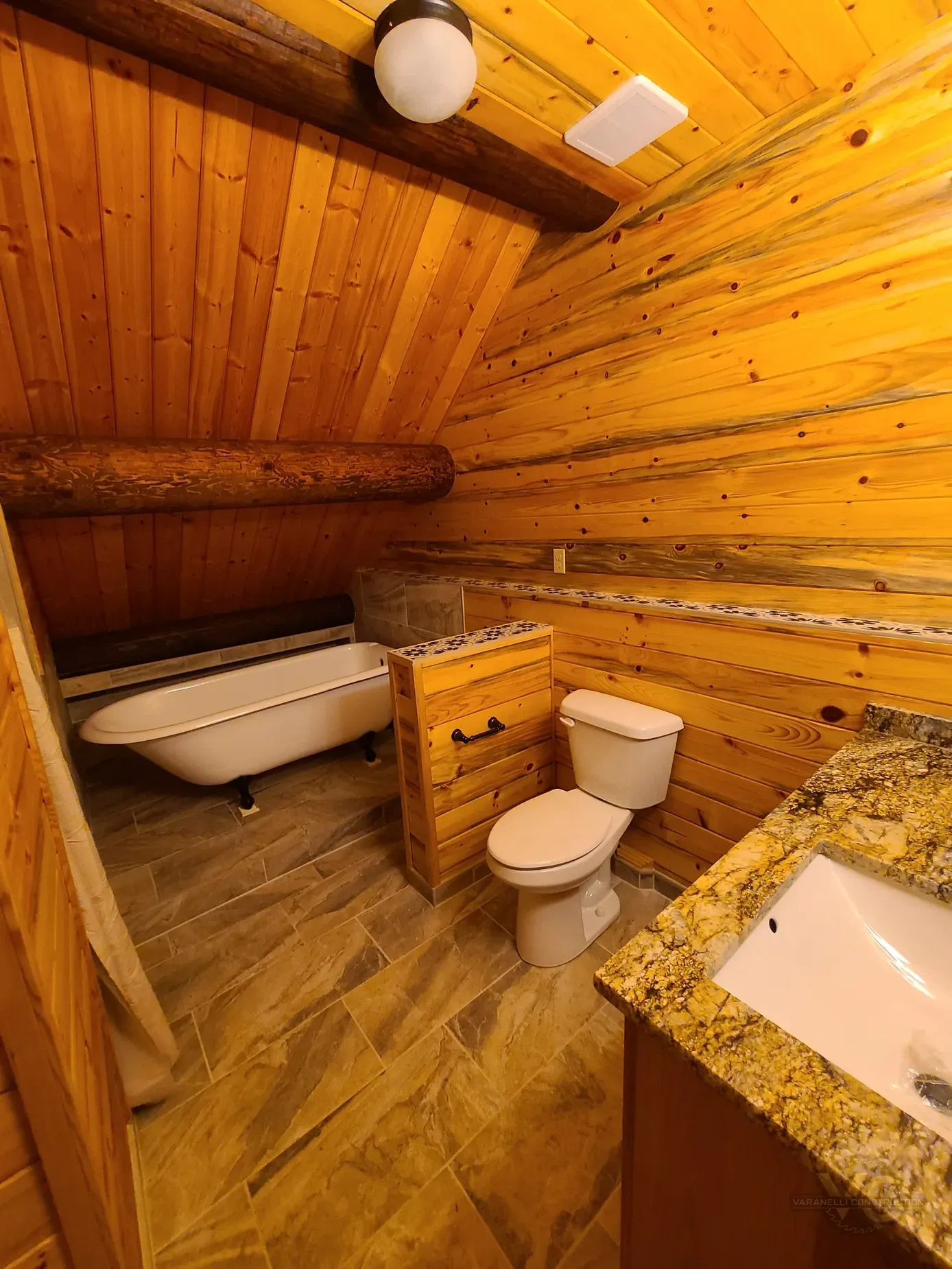 Rustic bathroom remodel by Varanelli Construction