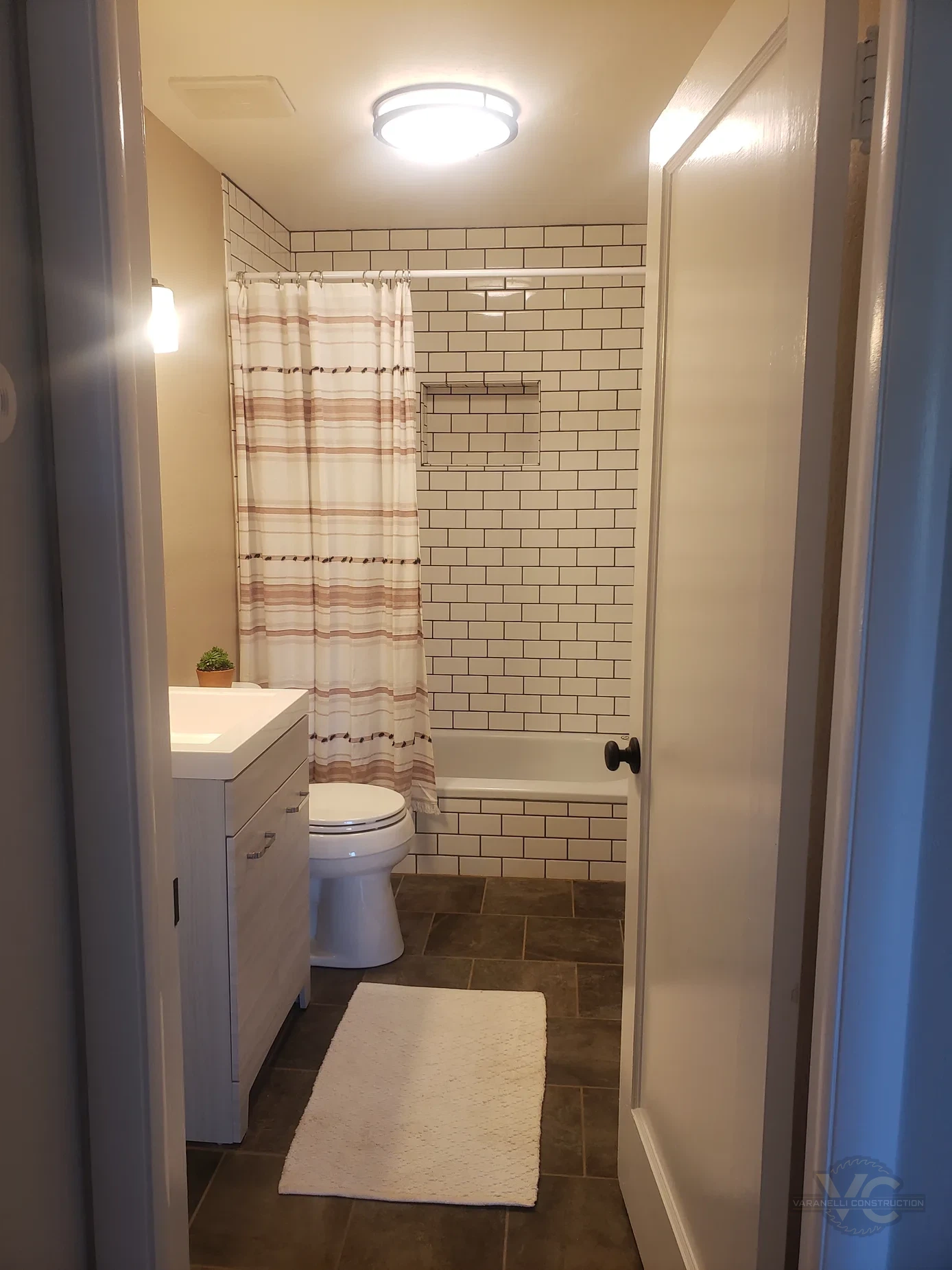 Subway tile shower and bathroom renovation by Varanelli Construction