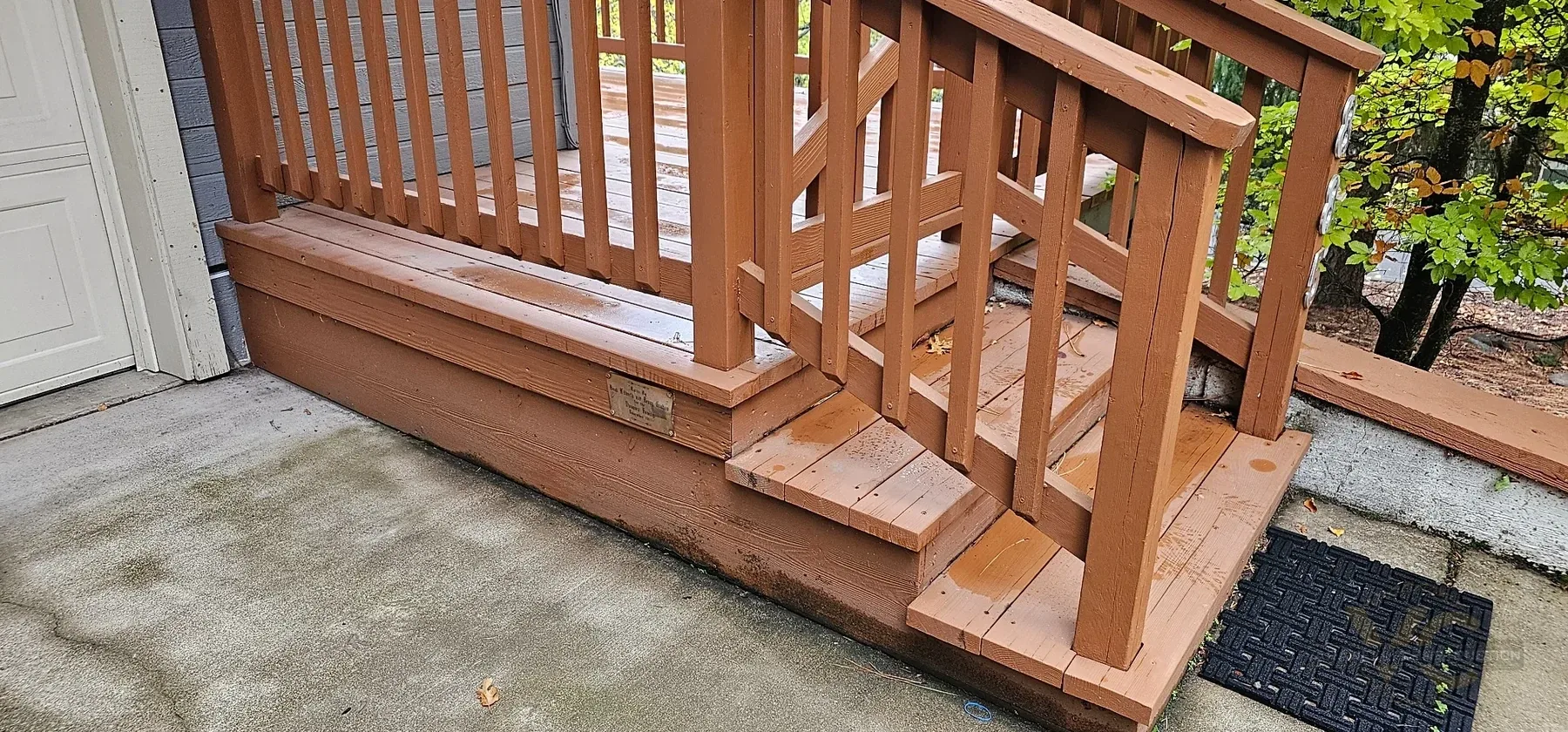Existing cedar deck stair and railing condition before repair in Ashland