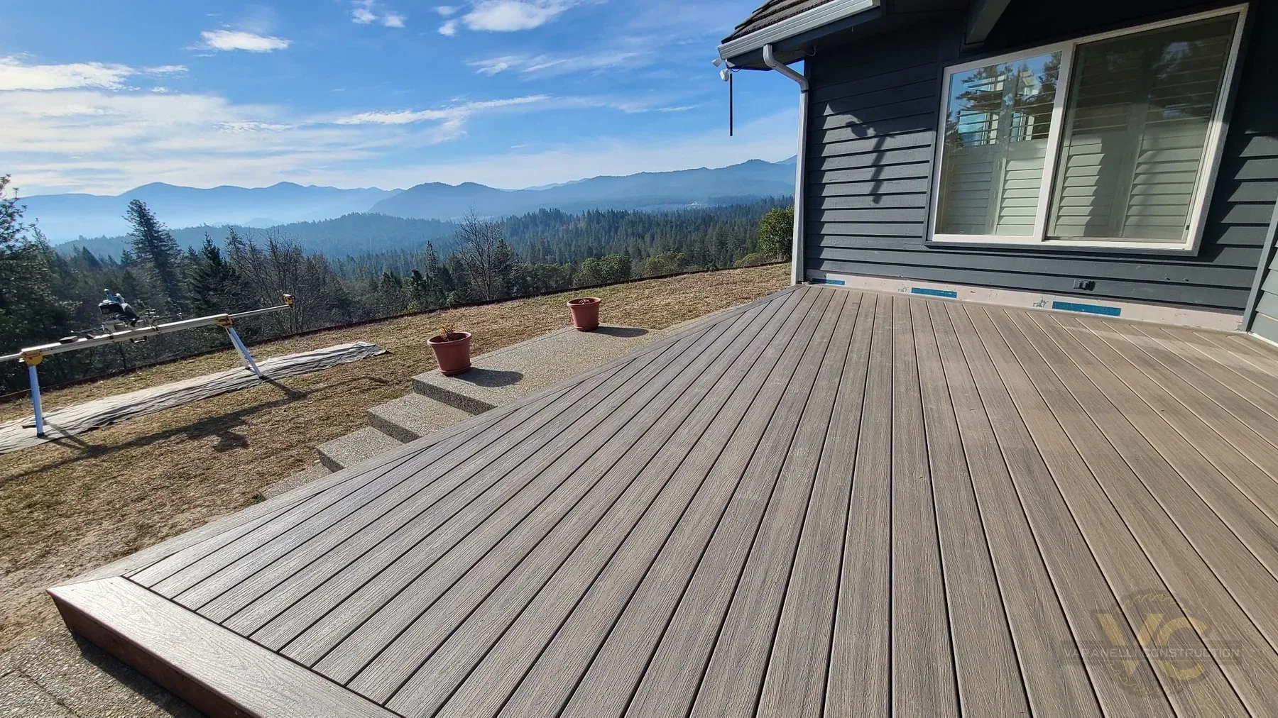 Finished mountain-view Trex deck with picture-frame border in Grants Pass, Oregon