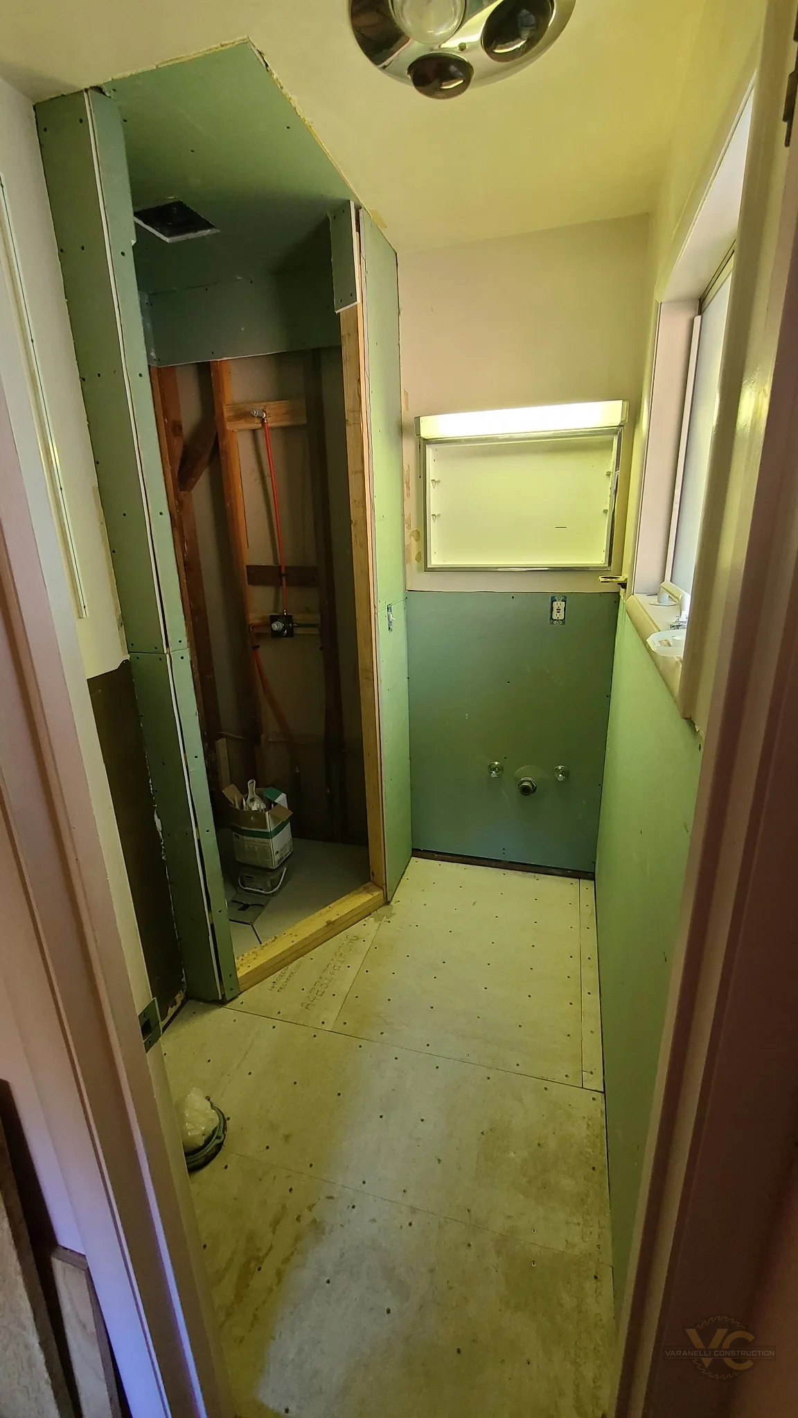 Wall and shower preparation during a small bathroom remodel in Grants Pass, Oregon