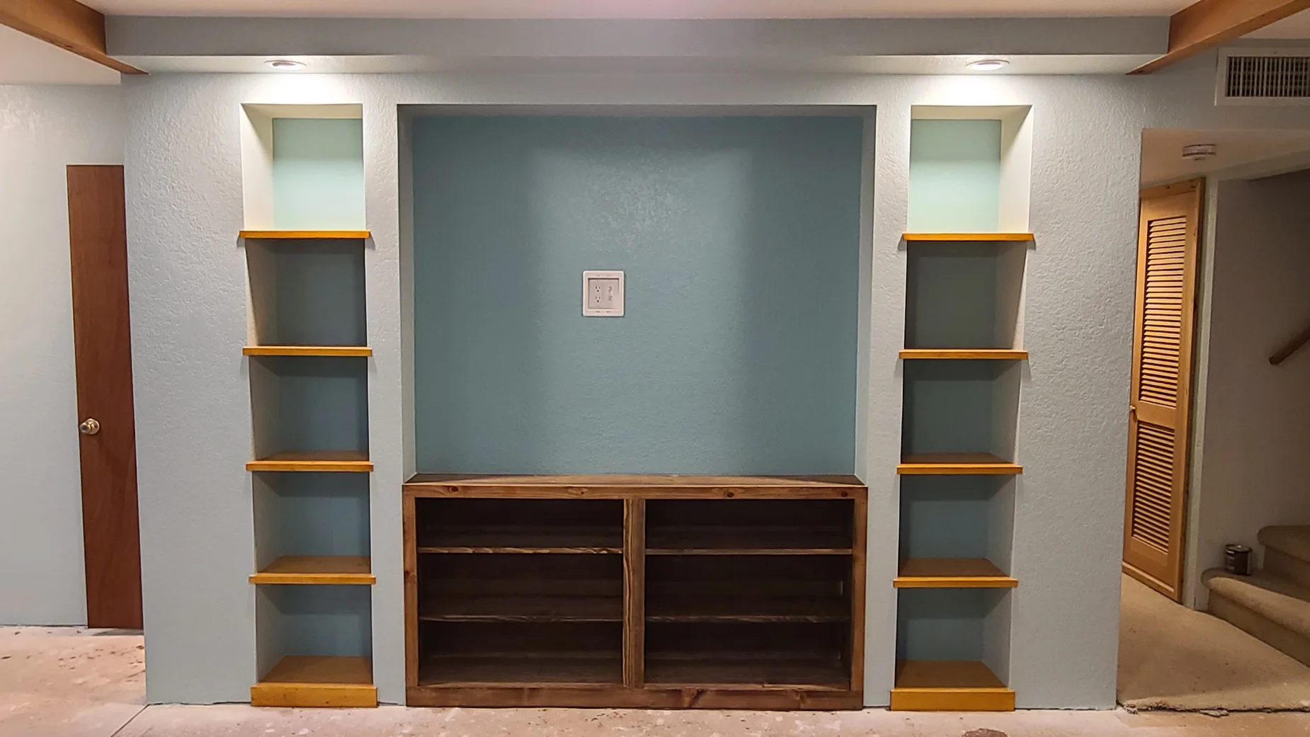 Custom built-in entertainment wall by Varanelli Construction