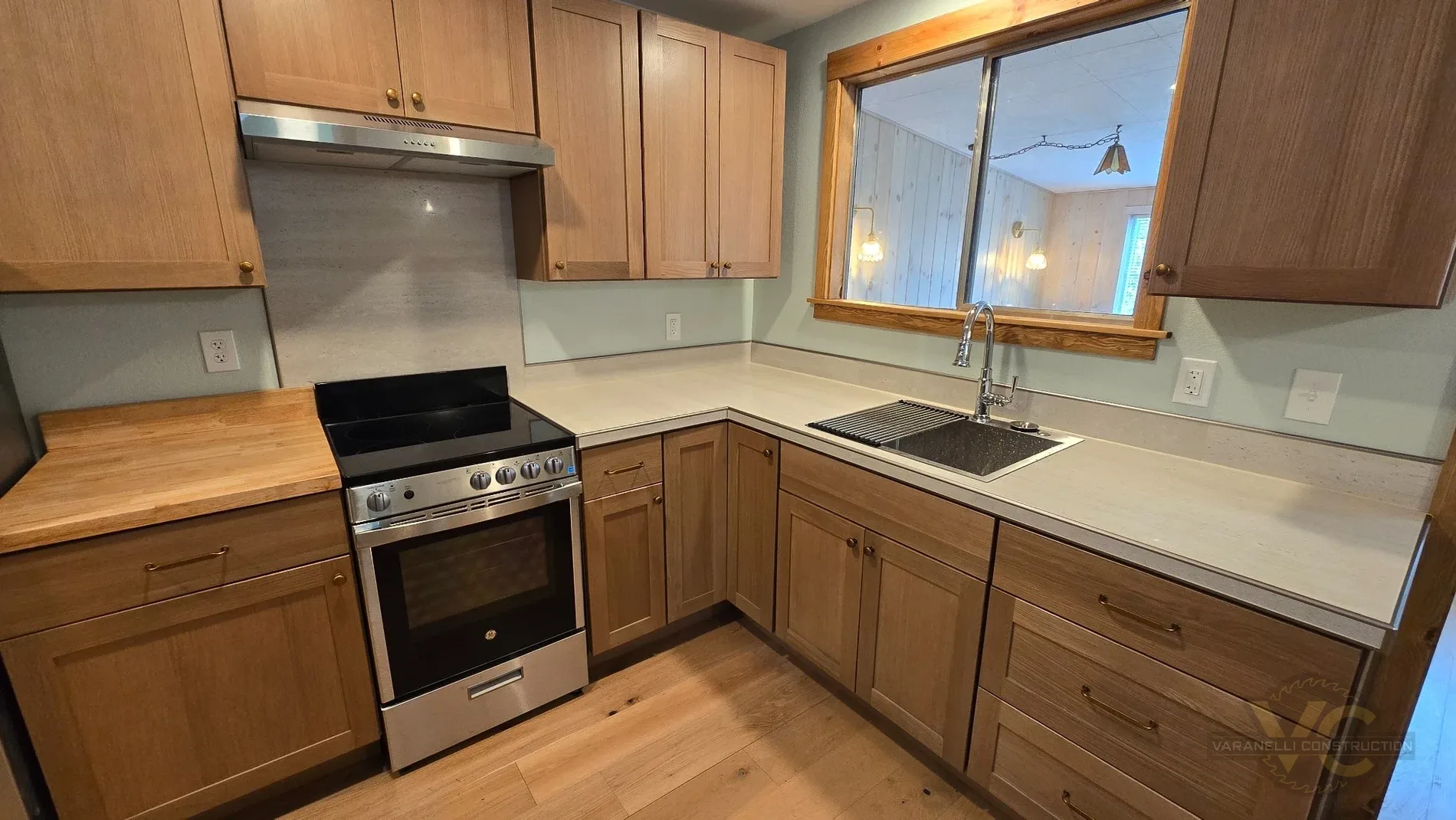 Finished wood-cabinet kitchen renovation by Varanelli Construction