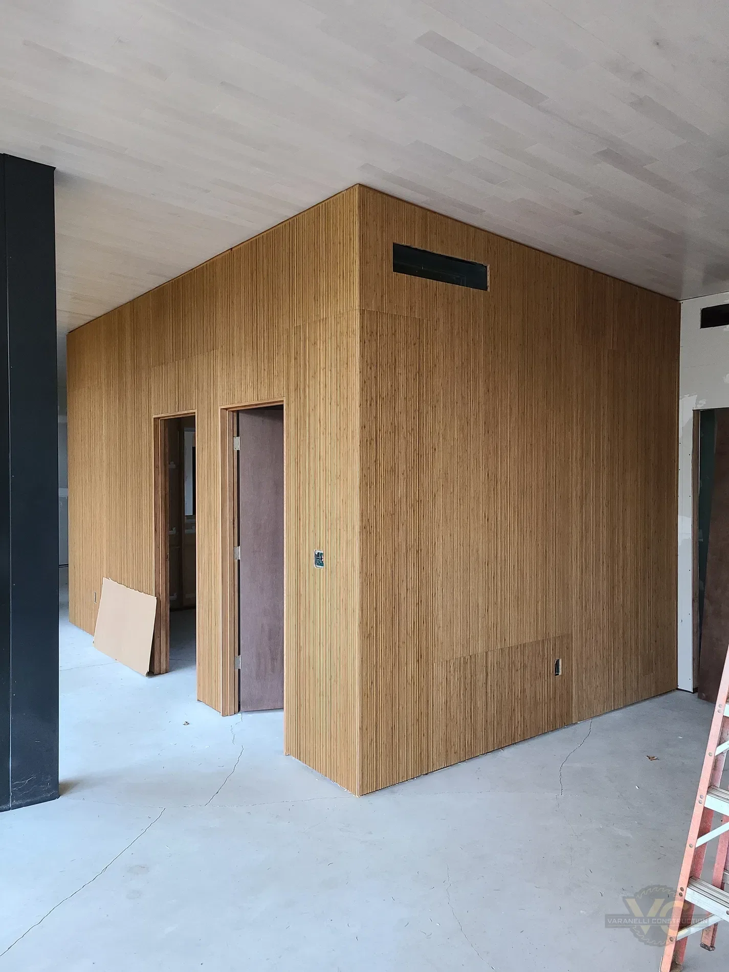 Finished wood-clad interior buildout by Varanelli Construction