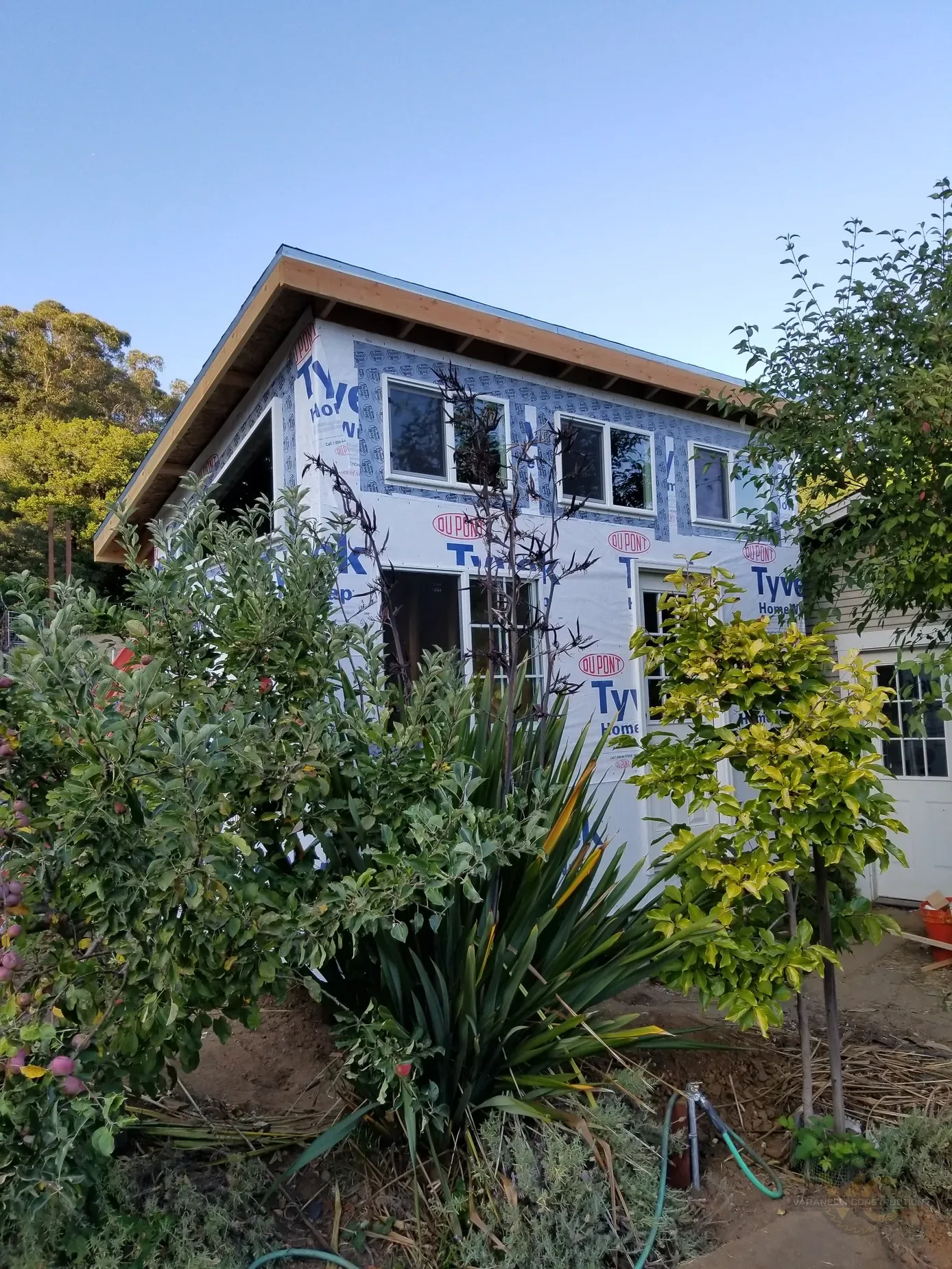 Exterior view of residential window installation by Varanelli Construction